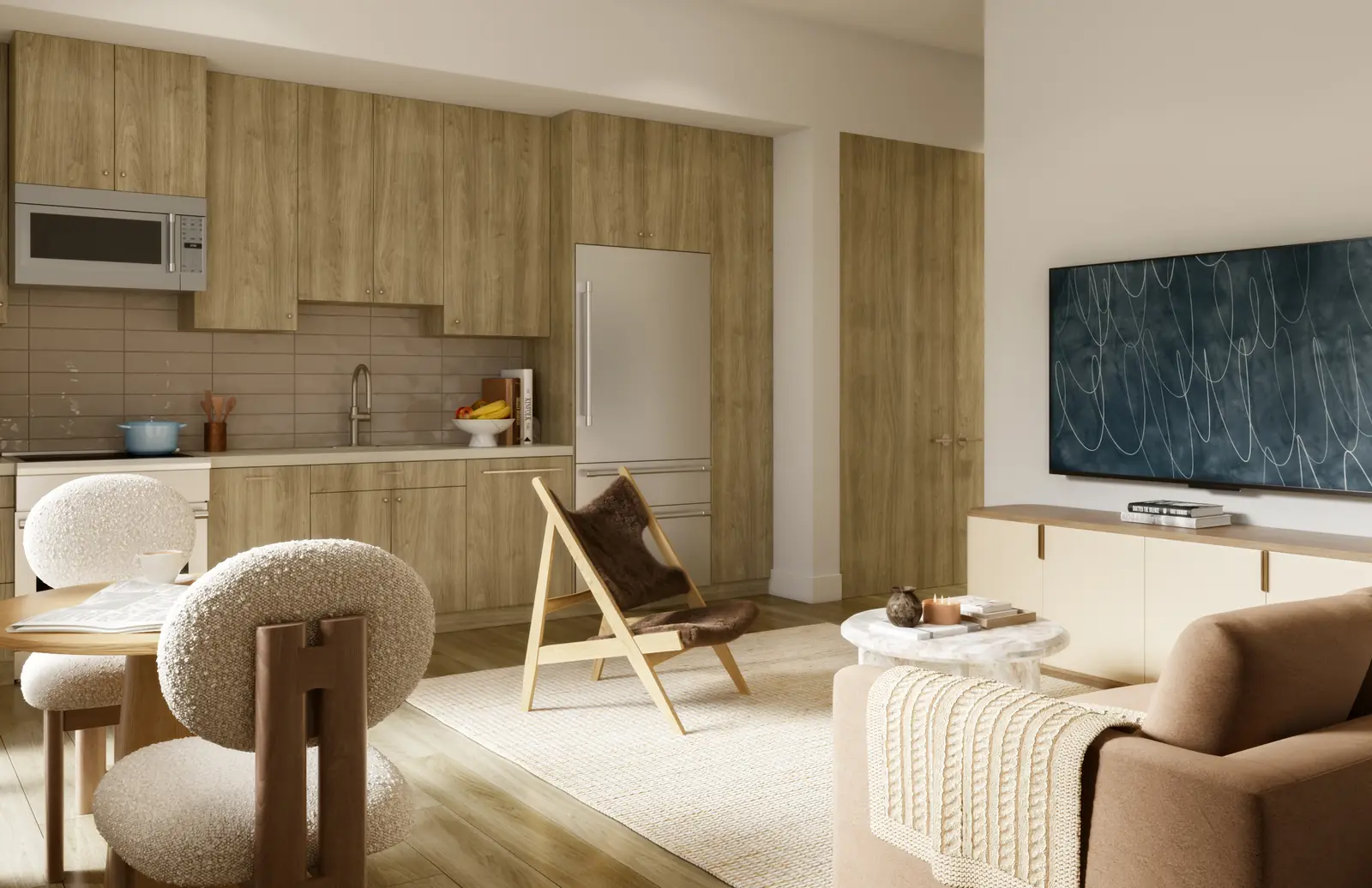 Open living and kitchen with rounded chairs in cream boucle