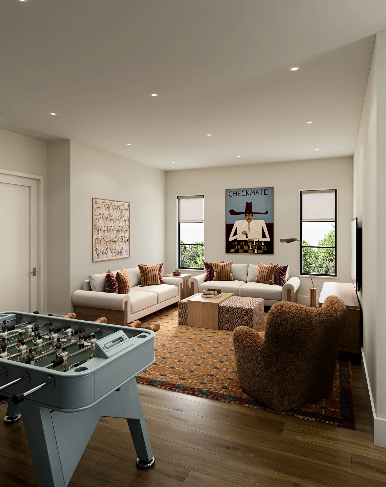 Game lounge rendering with cream sofas, a foosball table and western art